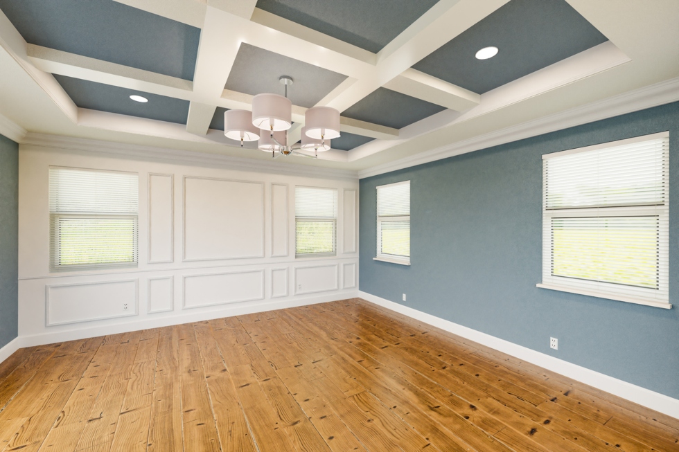 Beautiful Blue-Gray Custom Master Bedroom Complete with Entire Wainscoting Wall, Fresh Paint, Crown molding