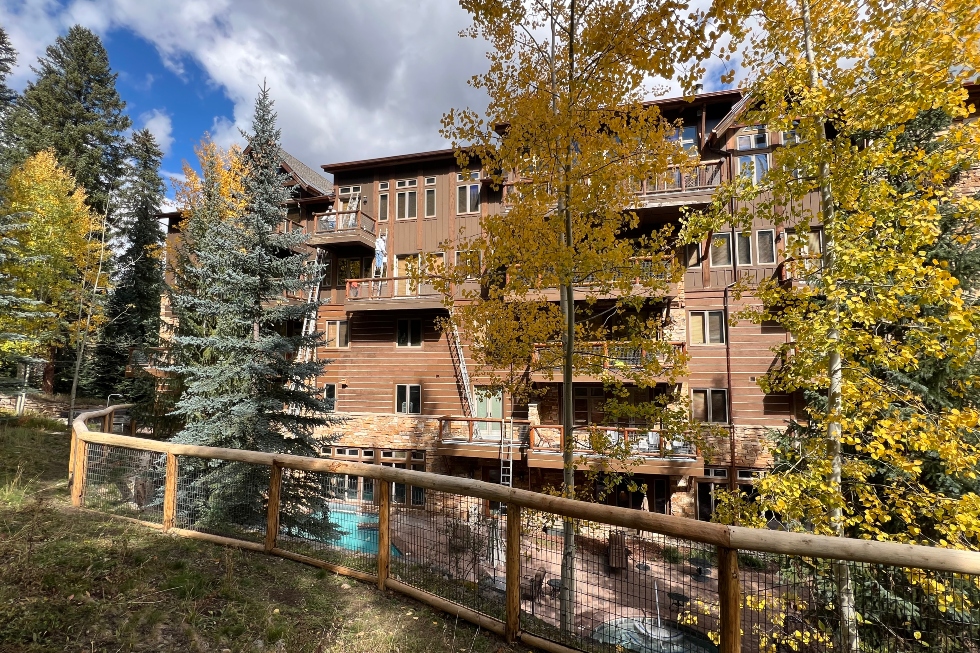 Harmony team painting apartment building in Denver