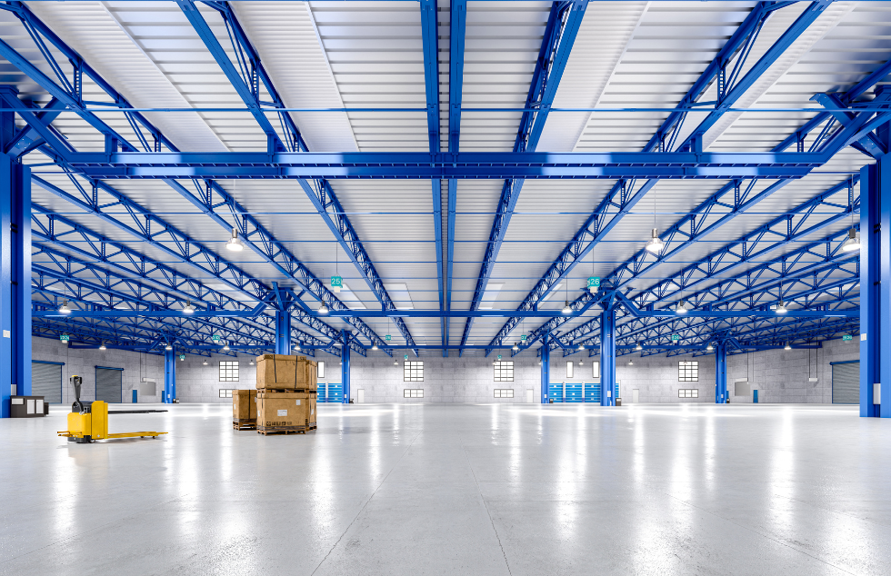 Freshly painted warehouse interior designed for visibility, durability, and industrial operations.