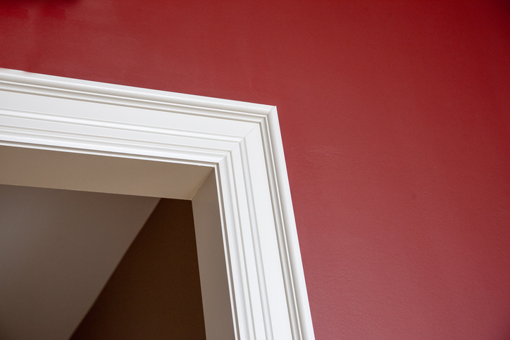 door casing on a red wall