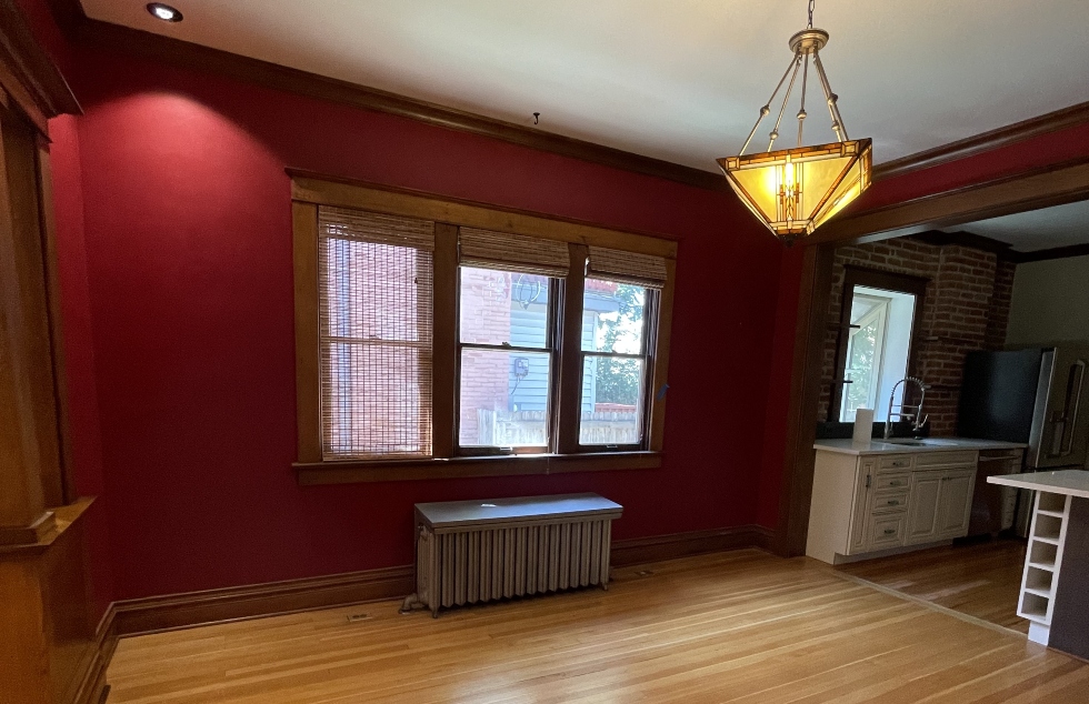 living area painted with a deep red color