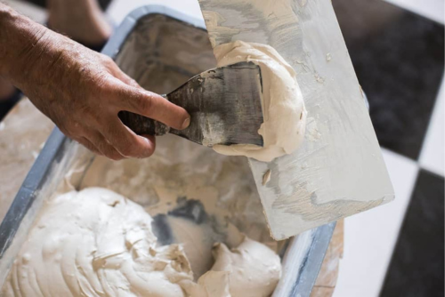 Skim Coating: Transforming Popcorn Ceilings into Smooth Surfaces