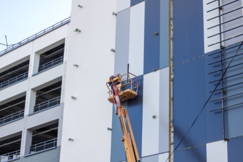 painting a commercial building